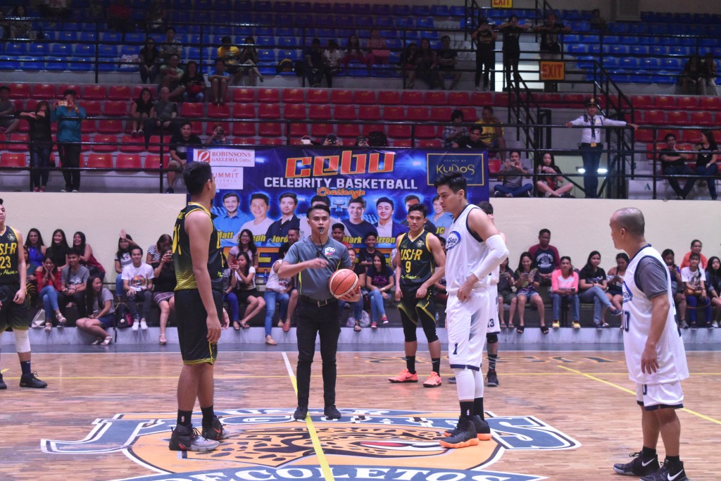 Jump Ball. Start of match between the USJ-R Jaguars and the Celebrity Players.